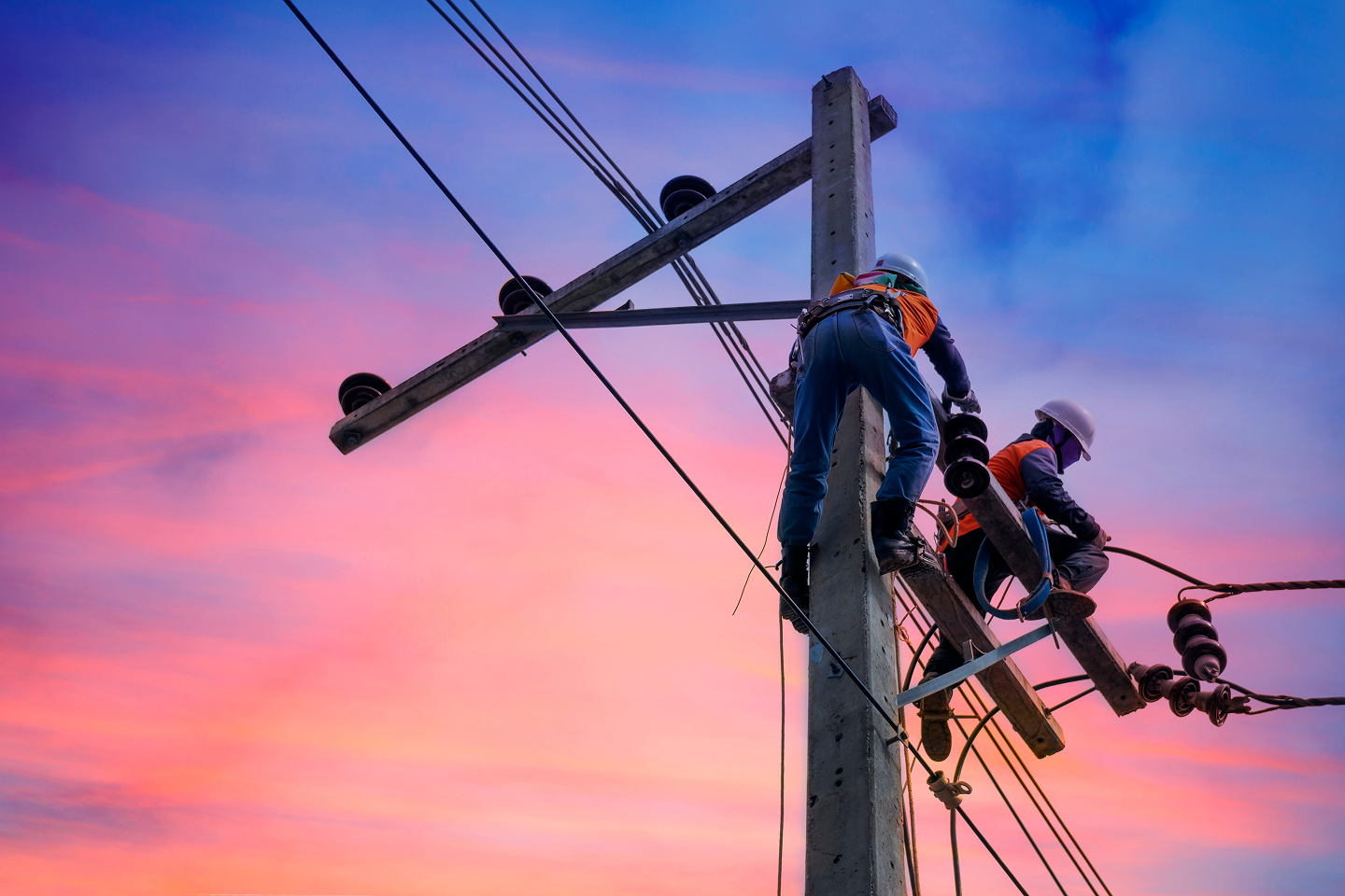 workers adjusting powerline